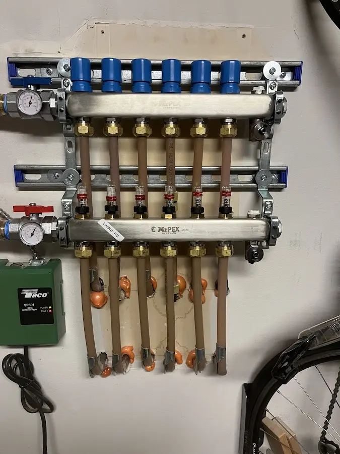 Plumber performing Gas Leak Detection at a residential property in Grand Rapids